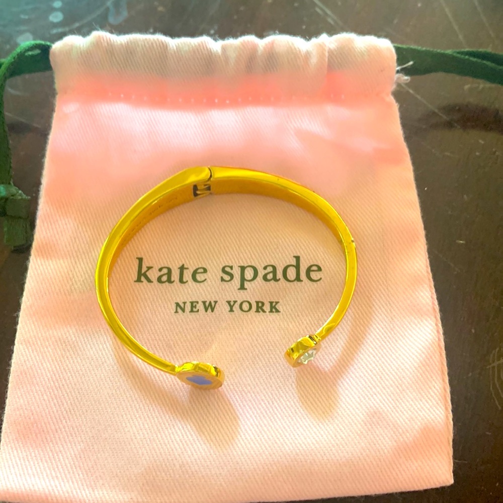 Kate Spade hinged cuff. Perfect condition with dust bag
